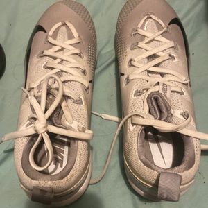 Fastpitch cleats, metal. grey and white